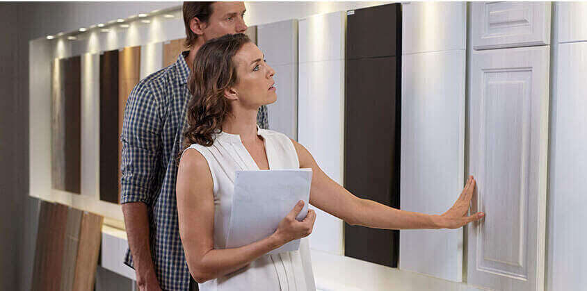 Choosing door and finish samples in the showroom