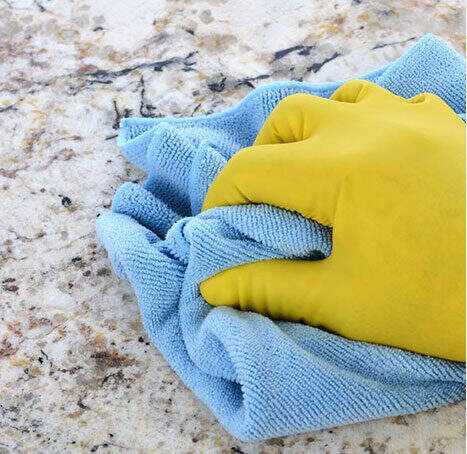 Applying sealer to a granite countertop