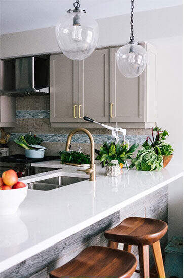 Modern kitchen faucet in a traditional setting